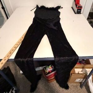 adult one size stretch black one piece outfit with fur at chest and leg hems
